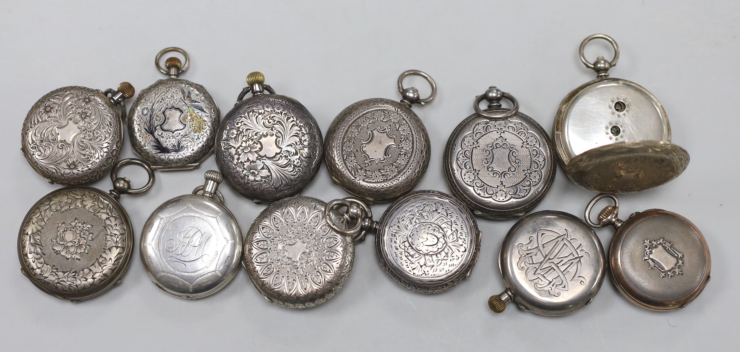 Twelve assorted mainly early 20th century silver or white metal fob watches, including enamelled and half hunter retailed by Hopkins & Hopkins of Dublin.